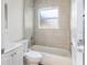 Clean bathroom with a shower/tub combo and tile surround at 3457 22Nd S Ave, St Petersburg, FL 33711