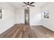 Bright bedroom with wood-look flooring and ceiling fan at 3457 22Nd S Ave, St Petersburg, FL 33711