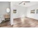 Bright bedroom with wood-look floors and ceiling fan at 3457 22Nd S Ave, St Petersburg, FL 33711