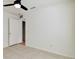 Bedroom featuring neutral walls, tile flooring, and a ceiling fan at 3232 Gianna Way, Land O Lakes, FL 34638