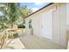 Charming home with a deck, landscaping, and a side entrance at 6907 N 20Th St, Tampa, FL 33610