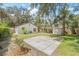 Spacious backyard featuring a patio, a shed, and a home exterior at 6907 N 20Th St, Tampa, FL 33610