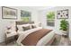 Bedroom featuring a comfortable bed, two windows, and coordinated décor and rug at 6907 N 20Th St, Tampa, FL 33610