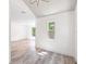 Bright living room featuring wood floors and recessed lighting at 6907 N 20Th St, Tampa, FL 33610