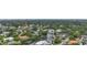 Aerial view of a neighborhood featuring houses near a waterway at 4915 W Melrose N Ave, Tampa, FL 33629