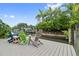 Private dock with colorful Adirondack chairs at 4915 W Melrose N Ave, Tampa, FL 33629