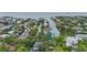 Aerial view showing home's location on a canal with water access at 4915 W Melrose N Ave, Tampa, FL 33629