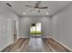 Bedroom with wood-look floors and sliding glass doors at 2604 N 29Th St, Tampa, FL 33605