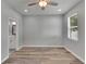 Bedroom with wood-look floors and access to bathroom at 2604 N 29Th St, Tampa, FL 33605