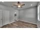 Bedroom with wood-look floors and access to bathroom at 2604 N 29Th St, Tampa, FL 33605