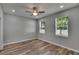 Bedroom with wood-look floors and ceiling fan at 2604 N 29Th St, Tampa, FL 33605
