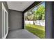 Covered patio overlooking a fenced-in backyard at 2604 N 29Th St, Tampa, FL 33605