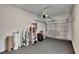 Garage with open overhead door and epoxy floor at 2604 N 29Th St, Tampa, FL 33605