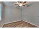 Spacious bedroom with wood-look flooring and ceiling fan at 2604 N 29Th St, Tampa, FL 33605