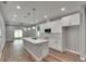 Modern kitchen with white cabinets, quartz countertops, and island at 2604 N 29Th St, Tampa, FL 33605