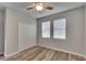 Bright bedroom featuring wood-look floors and double closet at 2604 N 29Th St, Tampa, FL 33605