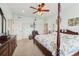 Spacious main bedroom with a king-size bed and en-suite bathroom at 5413 Cafrey Pl, Apollo Beach, FL 33572