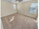 Spacious bedroom with carpeted floor and window coverings at 4417 Shrewbury Pl, Land O Lakes, FL 34638