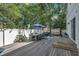 Spacious backyard deck with seating area and hammock at 2719 W Lake Ave, Tampa, FL 33607