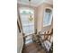 View of staircase from upper level landing at 180 Keystone Palms Blvd, Tarpon Springs, FL 34688