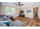 Bonus room with sectional sofa and large TV at 180 Keystone Palms Blvd, Tarpon Springs, FL 34688