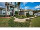 Elegant walkway leading to the entrance of the house at 180 Keystone Palms Blvd, Tarpon Springs, FL 34688