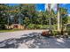 Landscaped entrance to Keystone Palms Estates at 180 Keystone Palms Blvd, Tarpon Springs, FL 34688