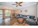 Spacious bonus room with L-shaped sectional sofa at 180 Keystone Palms Blvd, Tarpon Springs, FL 34688