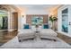 Relaxing sitting area with chaise lounges and a calming neutral color scheme at 180 Keystone Palms Blvd, Tarpon Springs, FL 34688