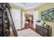 View of home office and adjacent living area at 180 Keystone Palms Blvd, Tarpon Springs, FL 34688