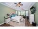 Spacious main bedroom with bay window, sitting area, and walk-in closet at 180 Keystone Palms Blvd, Tarpon Springs, FL 34688