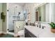 Modern bathroom with a glass shower and marble tile at 180 Keystone Palms Blvd, Tarpon Springs, FL 34688