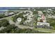 Aerial view showcasing the community's layout and proximity to water at 241 S Mcmullen Booth Rd # 36, Clearwater, FL 33759