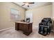 Home office with a desk, chair, and massage chair at 12314 Lake Jovita Blvd, Dade City, FL 33525