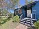 Quaint front entrance with steps leading to the front door at 319 N Jefferson Ave, Clearwater, FL 33755