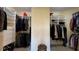 Large walk-in closet with custom shelving and drawers at 29731 Chapel Park Dr, Wesley Chapel, FL 33543