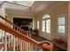 View of entryway, staircase, and double doors from the stairs at 29731 Chapel Park Dr, Wesley Chapel, FL 33543
