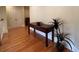 Bright hallway with hardwood floors and built-in console table at 29731 Chapel Park Dr, Wesley Chapel, FL 33543