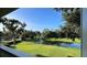 Enjoy the peaceful pond view from your backyard at 29731 Chapel Park Dr, Wesley Chapel, FL 33543