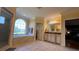 Spa-like bathroom featuring a garden tub, walk-in shower, and and sinks at 29731 Chapel Park Dr, Wesley Chapel, FL 33543