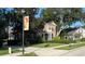 Two-story brick home with manicured lawn at 29731 Chapel Park Dr, Wesley Chapel, FL 33543