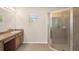Bathroom features a large shower and vanity at 12161 Cavern Rd, Spring Hill, FL 34609