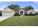 Beautiful one-story home with attached garage at 12161 Cavern Rd, Spring Hill, FL 34609