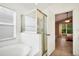 Bathroom featuring a shower, garden tub and access to the bedroom at 1122 Vinetree Dr, Brandon, FL 33510
