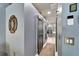 Elegant bathroom hallway with barn door and modern fixtures at 1926 Rutherford Dr, Dover, FL 33527