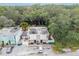 Aerial view of a duplex unit with parking and surrounding trees at 1905 E Mulberry Dr # 2, Tampa, FL 33604