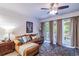 Comfortable living room with a sectional sofa and access to a patio at 1905 E Mulberry Dr # 2, Tampa, FL 33604