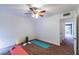 Spacious bedroom with access to a balcony and carpet flooring at 1905 E Mulberry Dr # 2, Tampa, FL 33604