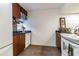 Updated kitchen featuring granite countertops and wood cabinets at 1905 E Mulberry Dr # 2, Tampa, FL 33604