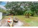 Kayaks rest on the grass near a peaceful waterfront at 1905 E Mulberry Dr # 2, Tampa, FL 33604